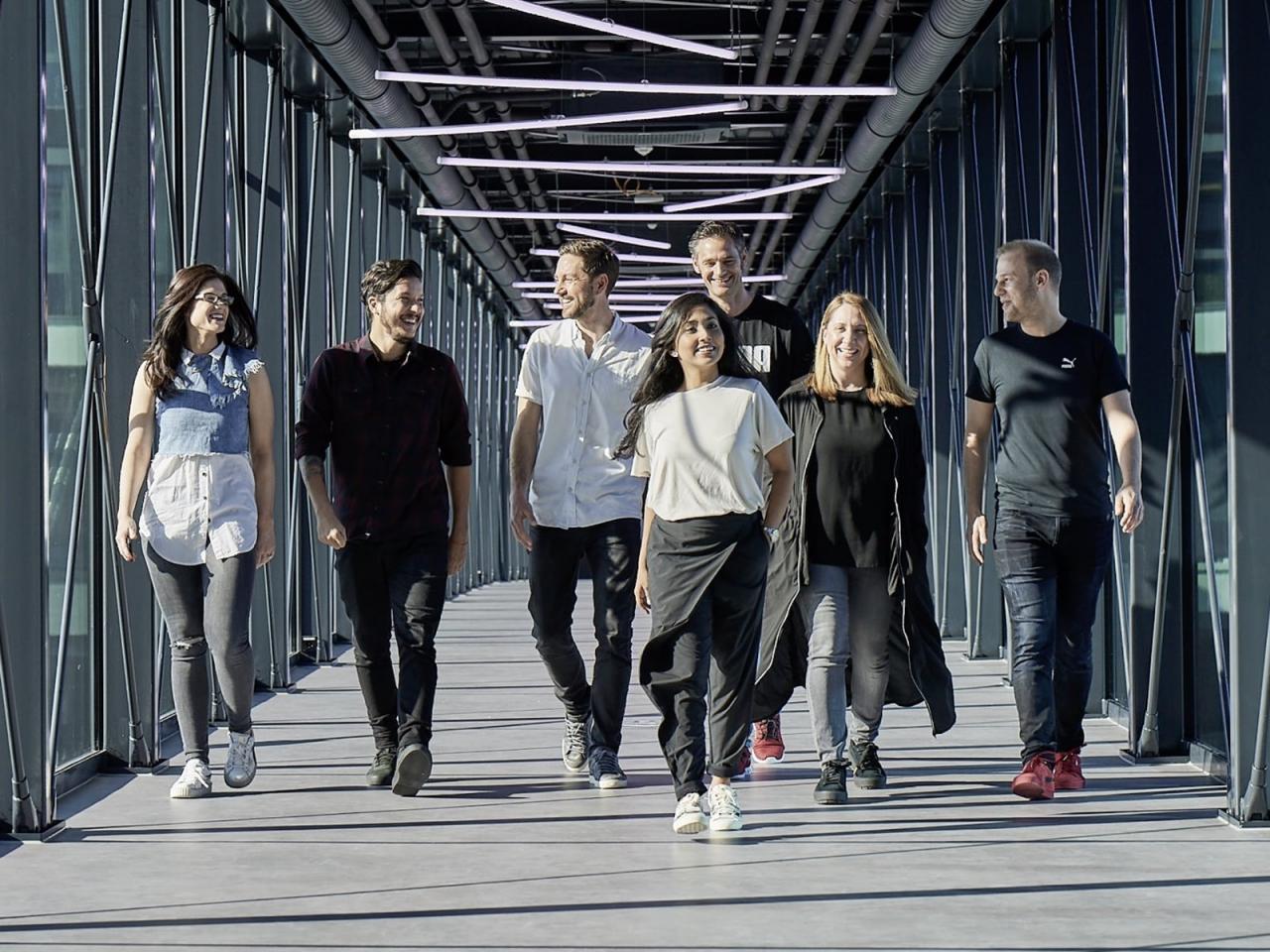 people walking on the PUMA bridge