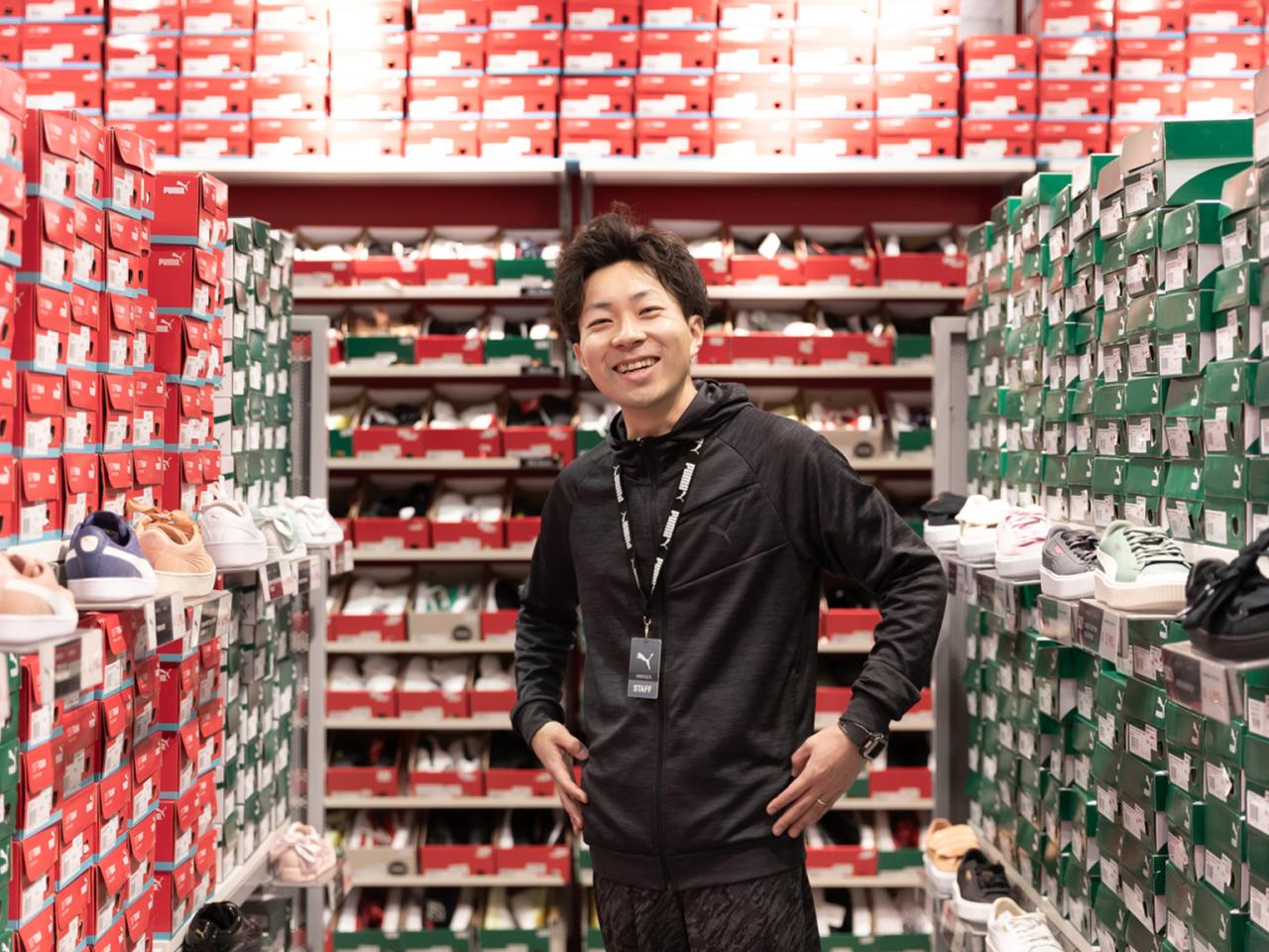 PUMA employee smiling